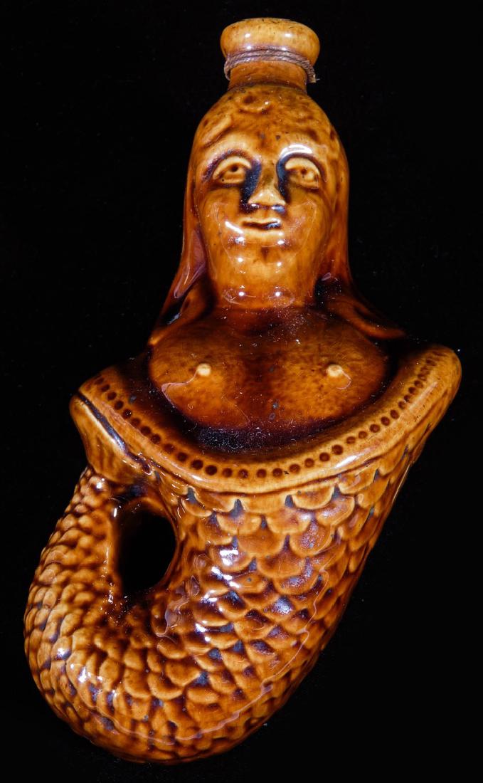 A 19TH C. BENNINGTON POTTERY MERMAID FLASK (1 of 10)