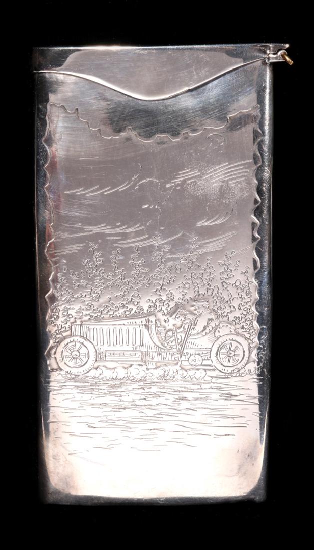 AN EARLY 20TH C. STERLING CASE WITH EARLY AUTOMOBILE (1 of 9)