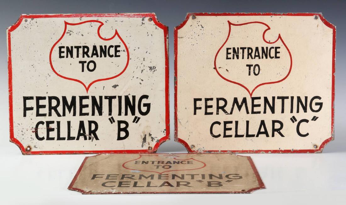 THREE LEMP BEER BREWERY FERMENTING CELLAR SIGNS: Three painted steel signs with the Lemp Beer (of St. Louis) shields, two with 'Entrance to Fermenting Cellar B' and one for cellar C. Measure 10.5 x 12 inches, single sided. We happily provide seamles