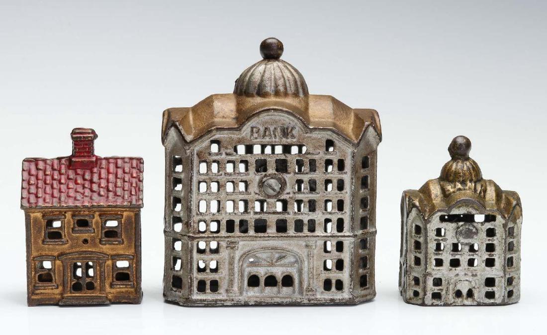 THREE CAST IRON BANK BUILDING STILL BANKS (1 of 6)