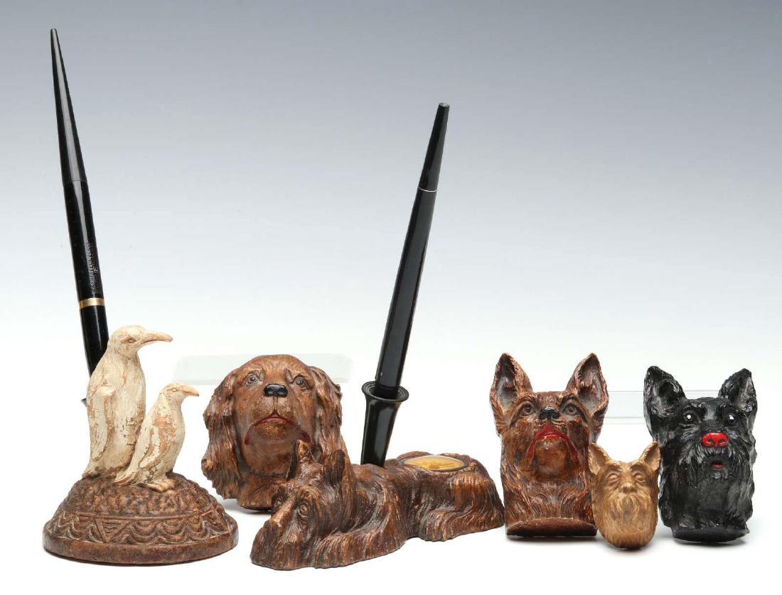 A GROUP OF SYROCO TYPE PEN HOLDERS AND PAPERWEIGHTS (1 of 10)