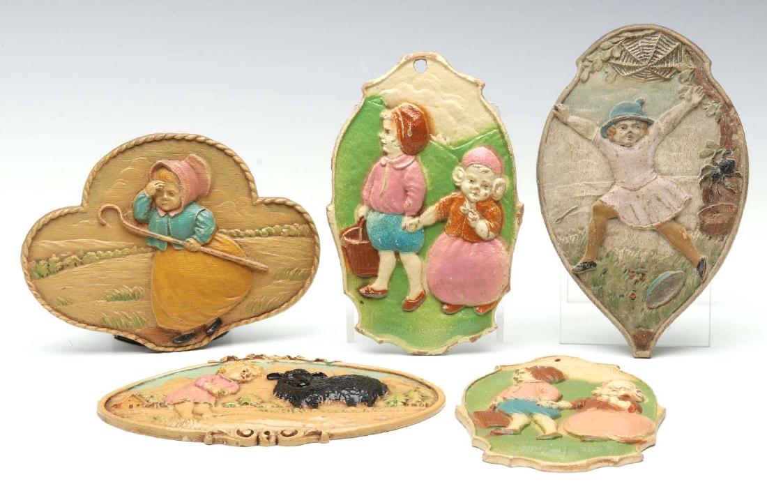 GROUP OF SYROCO NURSERY RHYME PLAQUES: Included are: Little Bo Peep, a pair of Jack and Jill, Little Miss Muffet, Ba Ba Black Sheep. The sizes range from 5 x 3 to 5.25 x 3.5 inches. We happily provide seamless in-house packing and shipping