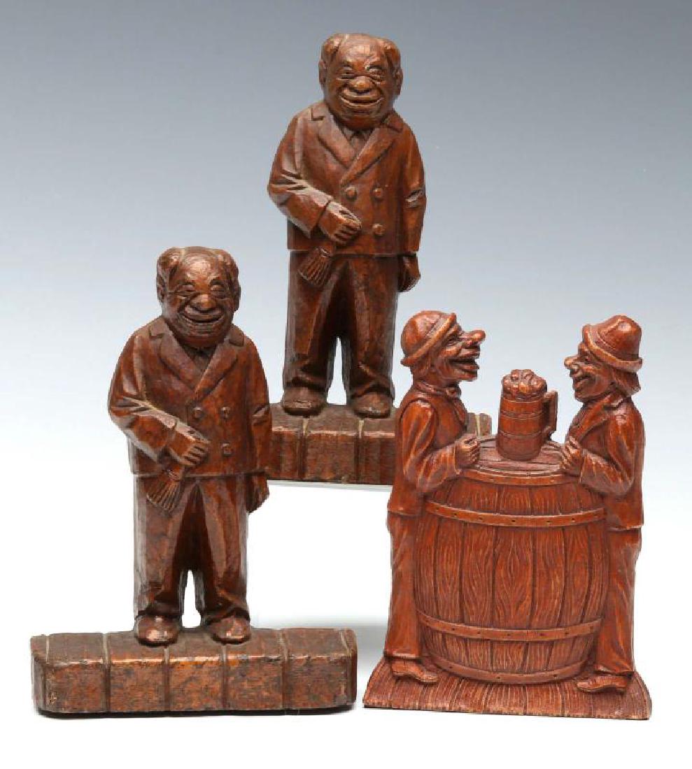SYROCO TYPE BOOKENDS AND BRUSH HOLDER: Bookends in a butler form and brush holder shows two men enjoying a beer. No makers marks were noted. Measures 5 x 3.5 inches. We happily provide seamless in-house packing and shipping services on nea