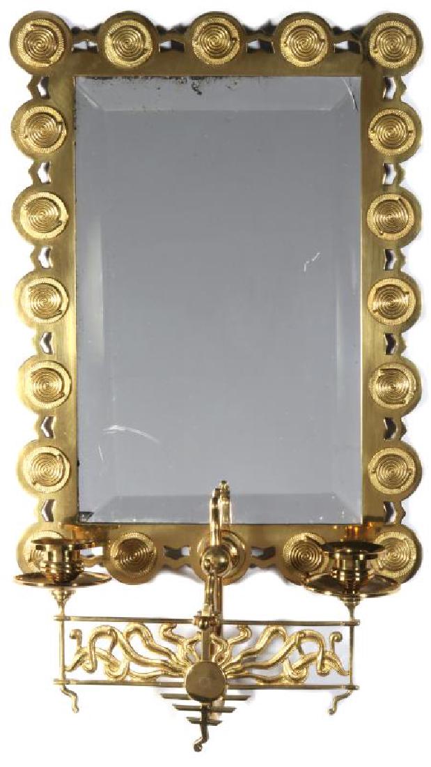 A CIRCA 1900 AESTHETIC MOVEMENT BRASS MIRROR SCONCE (1 of 8)