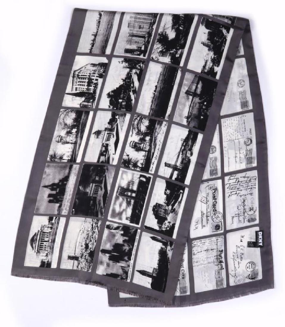 A DKNY SILK SCARF WITH VINTAGE POSTCARD IMAGES: A printed scarf double-sided with vintage postcard views of New York landmarks, the reverse side features the postmarks and greetings on the cards. Oblong scarf measures 17 x 59 inches. We happily pro