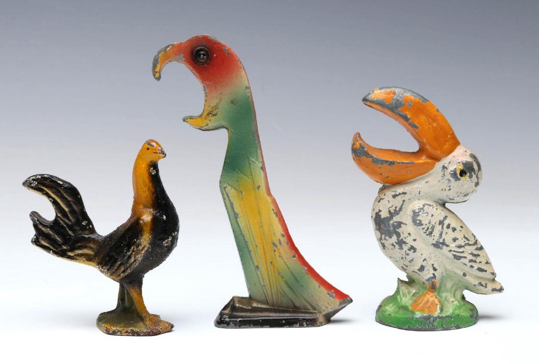 ART DECO FIGURAL IRON BOTTLE OPENERS (1 of 4)