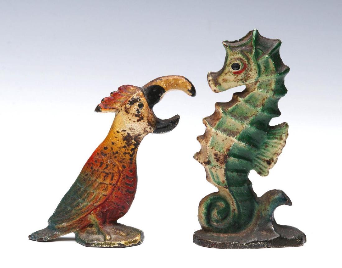 TWO CIRCA 1940 CAST FIGURAL IRON BOTTLE OPENERS (1 of 4)