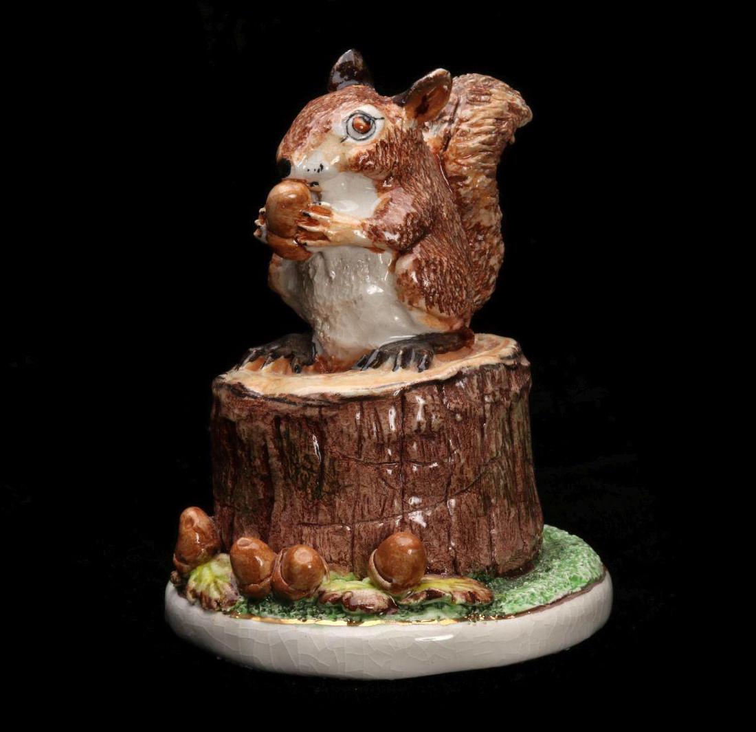 BASIL MATTHEWS SQUIRREL ON A STUMP FIGURE: Signed by the artist on the edge of the base. Measures 3 x 2.5 inches. We happily provide seamless in-house packing and shipping services on nearly everything we sell.