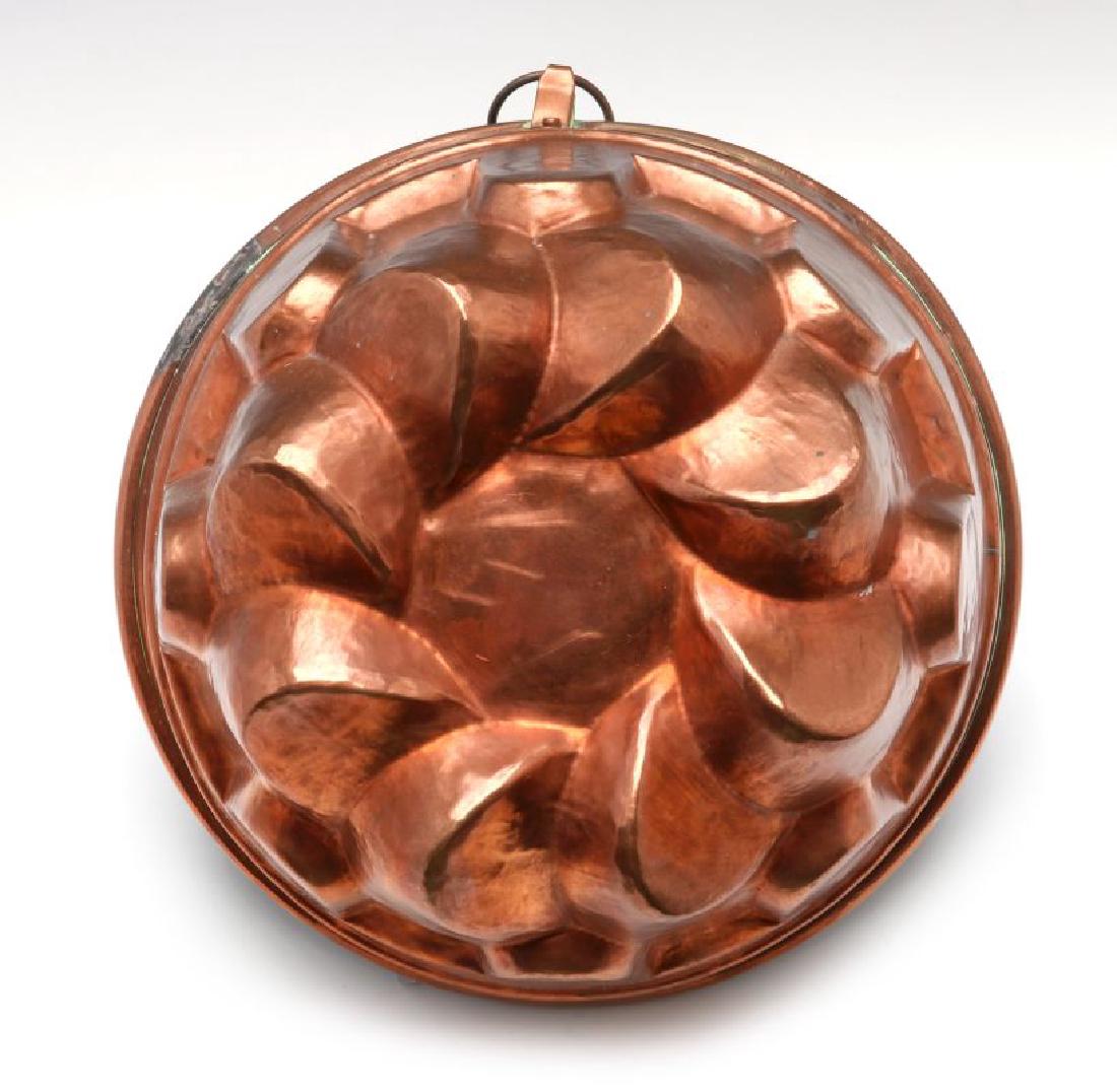 AN ANTIQUE HAMMERED COPPER FOOD MOLD (1 of 7)