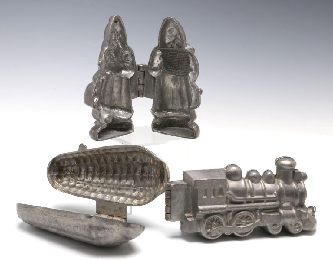 THREE PEWTER ICE CREAM MOLDS (1 of 8)