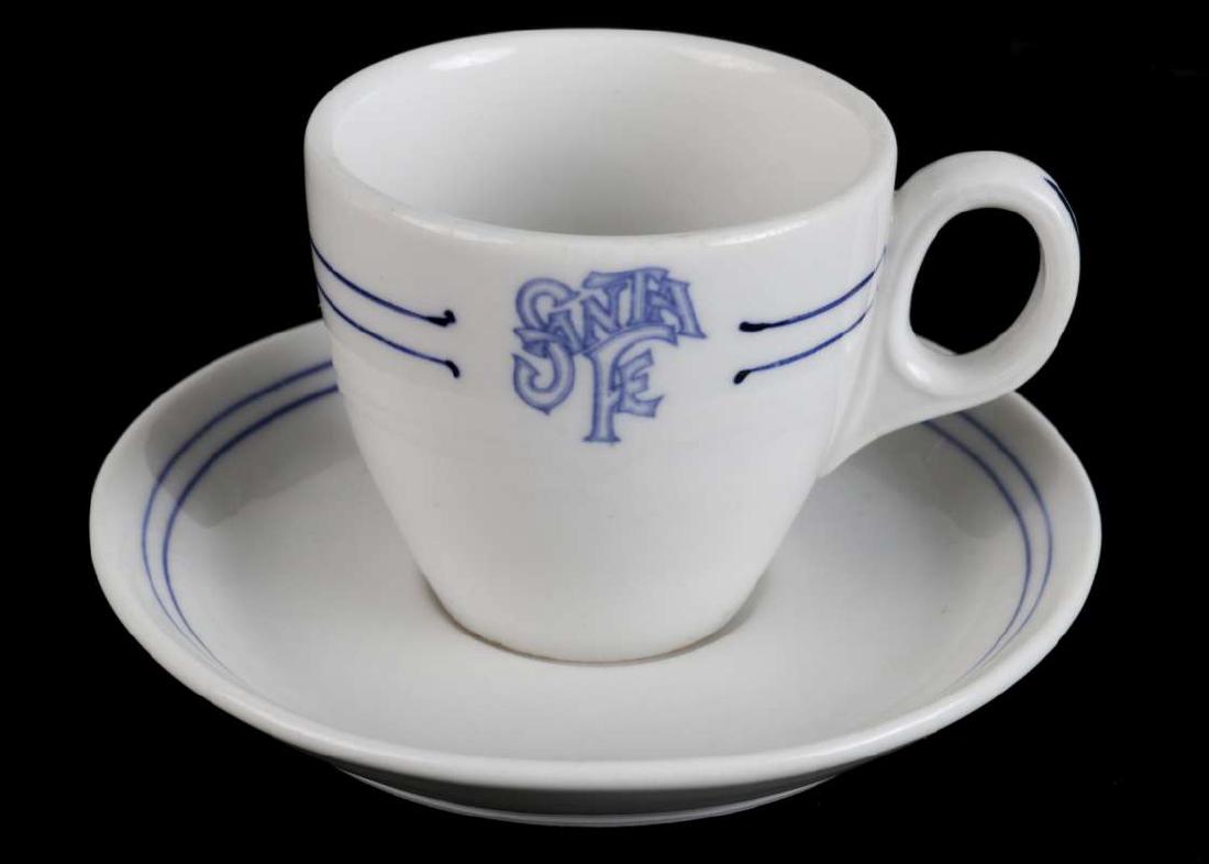 AT&SF SANTA FE BLEEDING BLUE DEMITASSE CUP, SAUCER: A Fine demitasse cup and saucer, both marked Albert Pick in blue. Cup measures 2.25 x 3.25 inches, saucer 4.5 inches. We happily provide seamless in-house packing and shipping services on nearly every