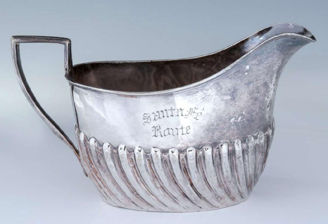 AN EARLY SANTA FE ROUTE SILVER CREAMER (1 of 9)