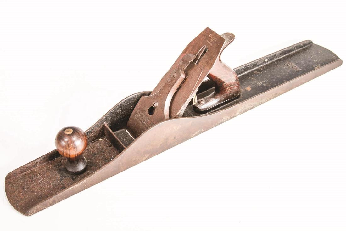 A STANLEY 24-INCH BAILEY NO. 8 JOINTER PLANE: Smooth sole, Sweetheart blade. Measures 5.5 x 23.5 x 3.75 inches. We happily provide seamless in-house packing and shipping services on nearly everything we sell.