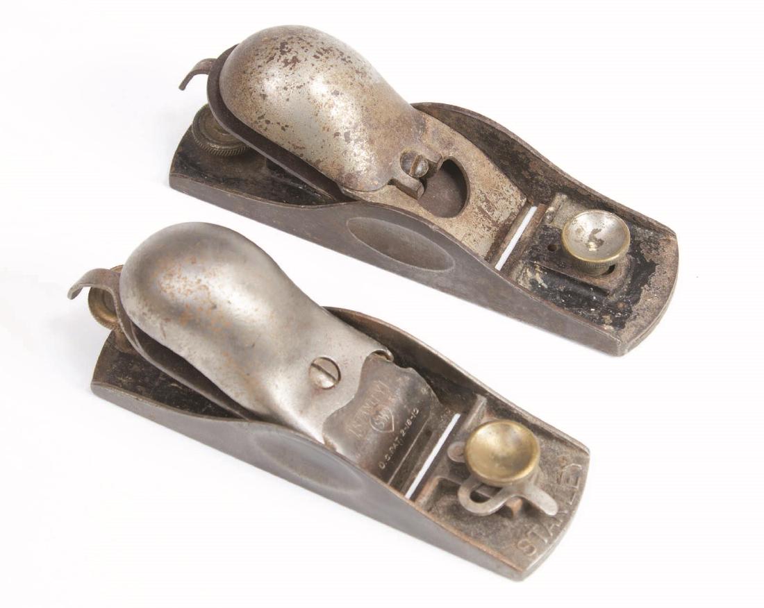 A STANLEY NO. 18 KNUCKLE JOINT BLOCK PLANE: One Stanley with Sweetheart SW heart, other simply marked Stanley. Measure 6 inches. We happily provide seamless in-house packing and shipping services on nearly everything we sell.