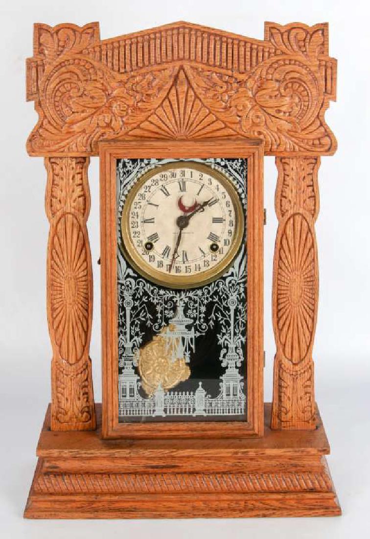 AN INGRAHAM 'PACIFIC' GINGERBREAD CALENDAR CLOCK (1 of 15)