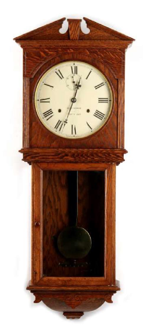 A SETH THOMAS 'UMBRIA' OAK WALL REGULATOR (1 of 8)