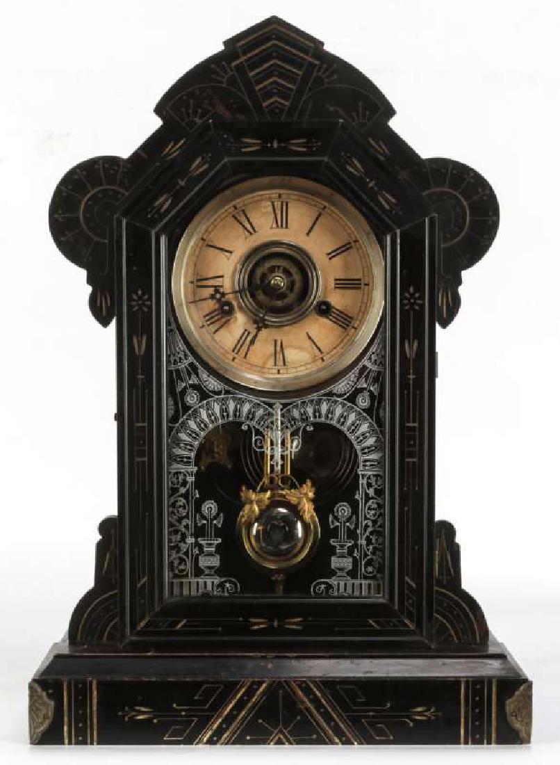 A WM. GILBERT 'MERL' GESSOED AND EBONISED CLOCK (1 of 11)