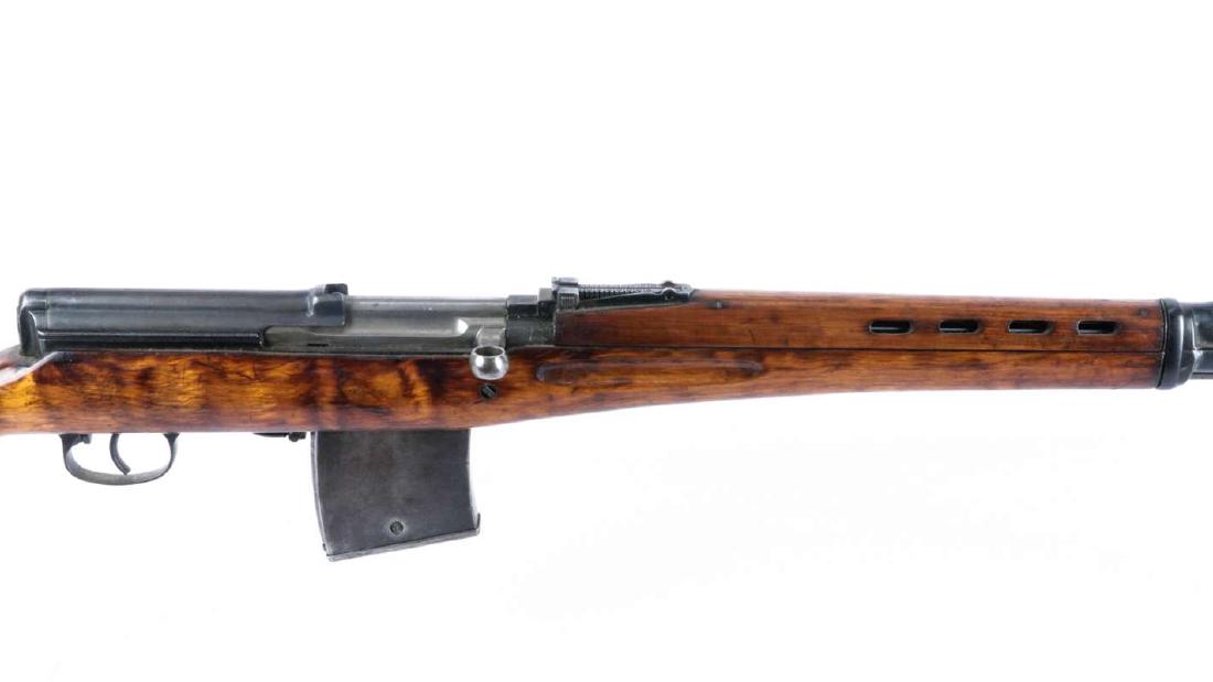 RUSSIAN WW2 M1938 'TOKAREV' (SVT) SEMIAUTO RIFLE: Serial number KA 1403, manufactured in 1941, complete and functional, bolt is mismatched as is the magazine, 90% finish probably reworked , has cleaning rod, wood is sound lightly sanded and refinishe