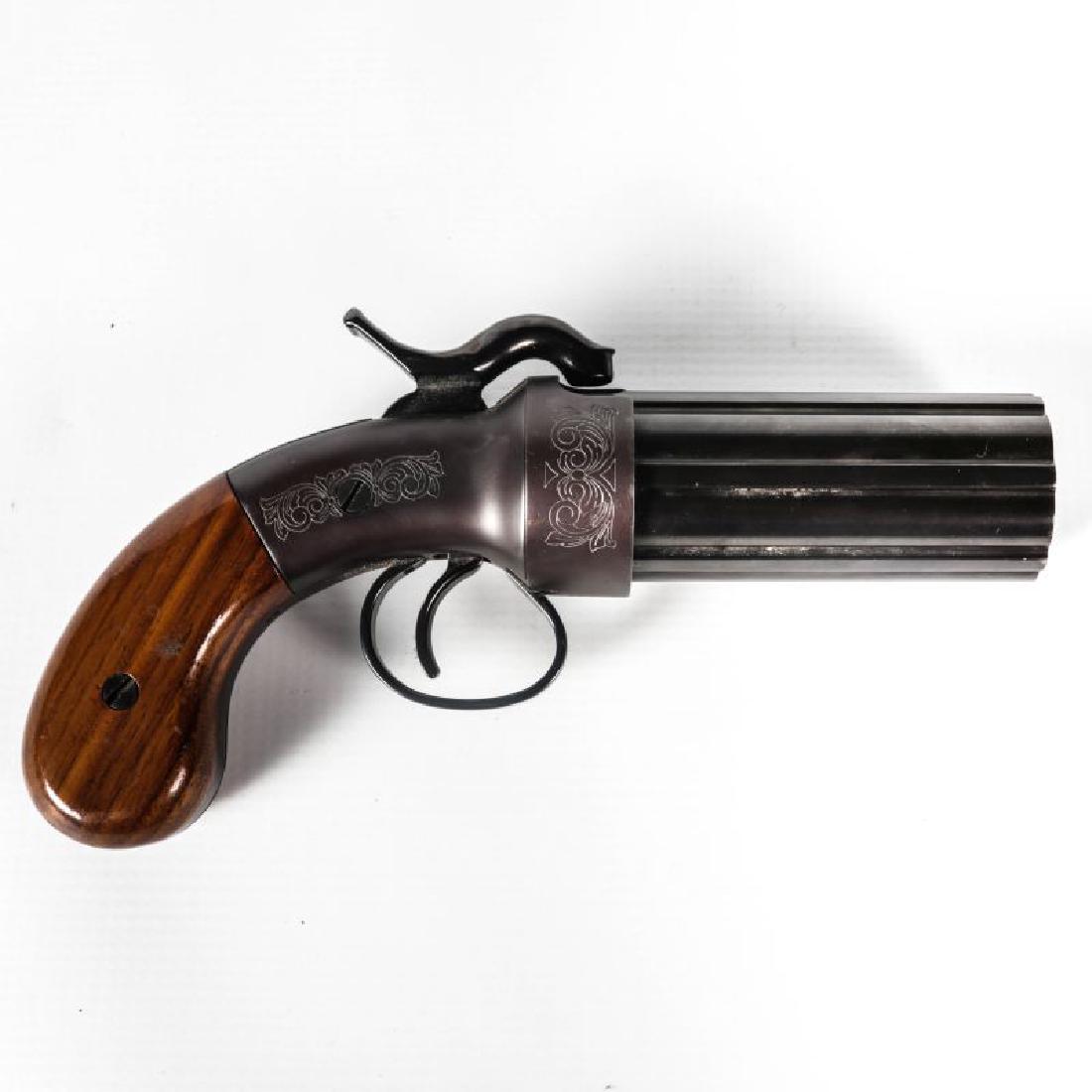 ETHAN ALLEN REPLICA PEPPERBOX CAP AND BALL PISTOL: Made by 'HOPPES' 38 CALIBER CAP & BALL SYSTEM, 3 1/4 inch cylinder, varnished wood grips, serial number P05028, some light engraving. We happily provide seamless in-house packing and shipping services