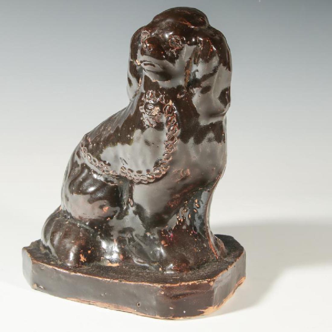 A MIDWEST STONEWARE SPANIEL, POSSIBLY MISSOURI (1 of 8)