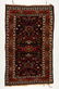 A CIRCA 1930s PERSIAN SCATTER RUG