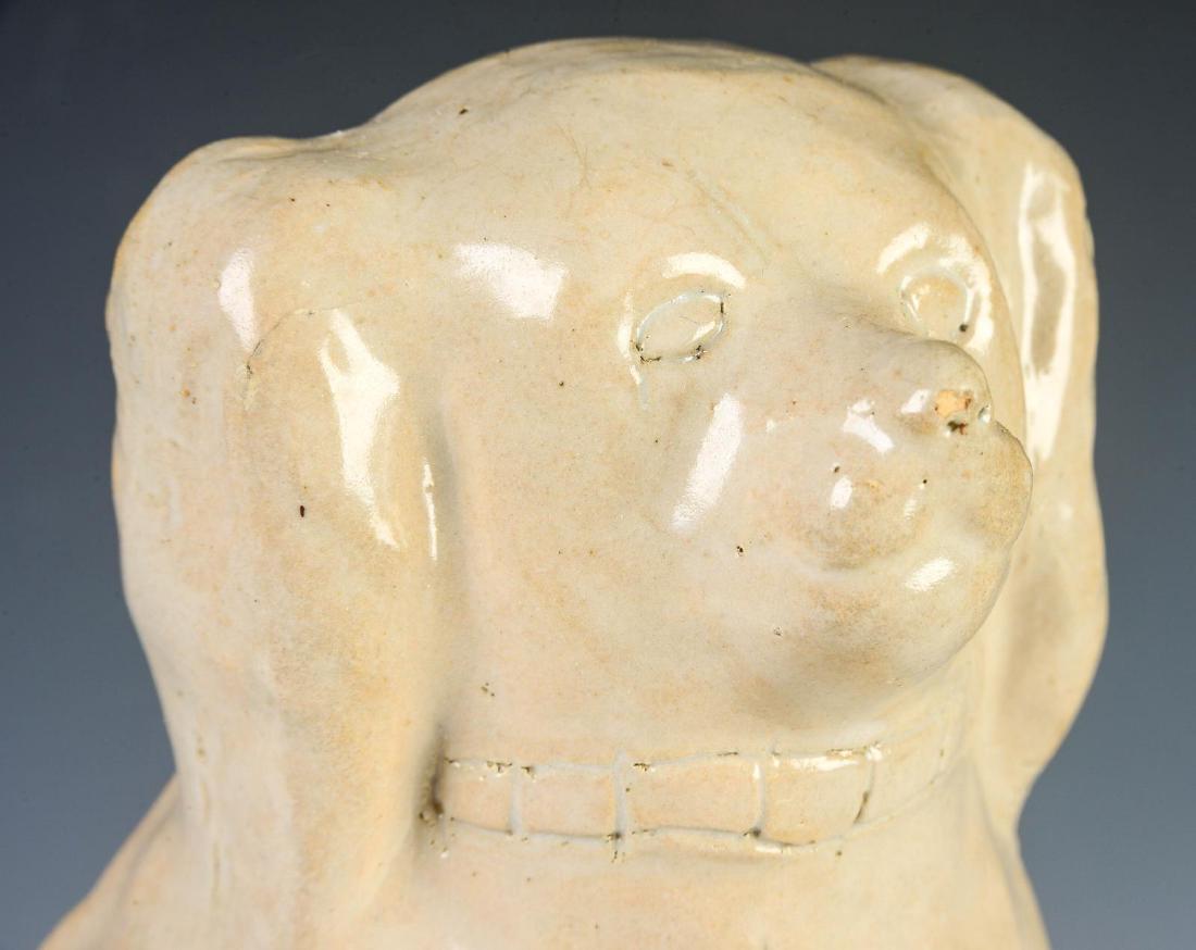 AN EARLY 20TH C. BRISTOL GLAZE STONEWARE SPANIEL (1 of 9)