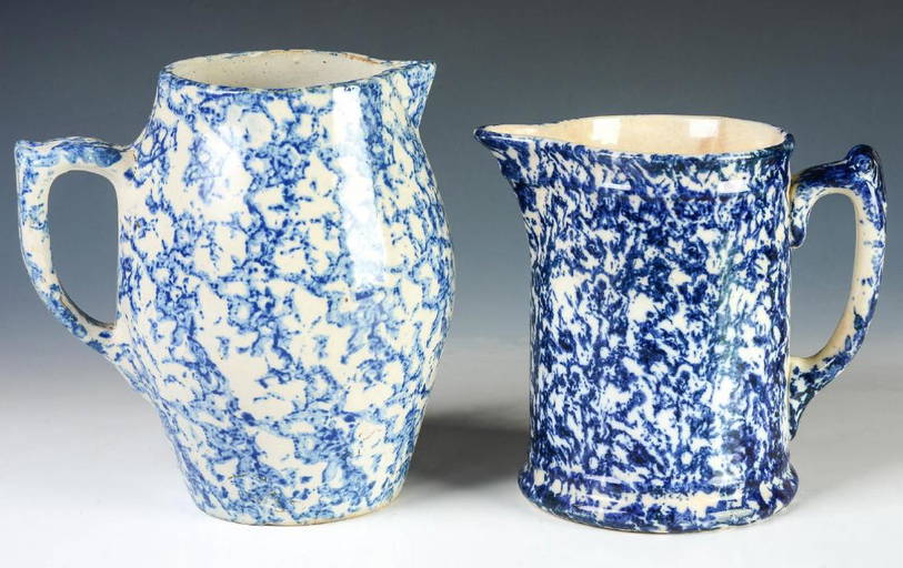 Two Blue And White Sponge Ware Pitchers