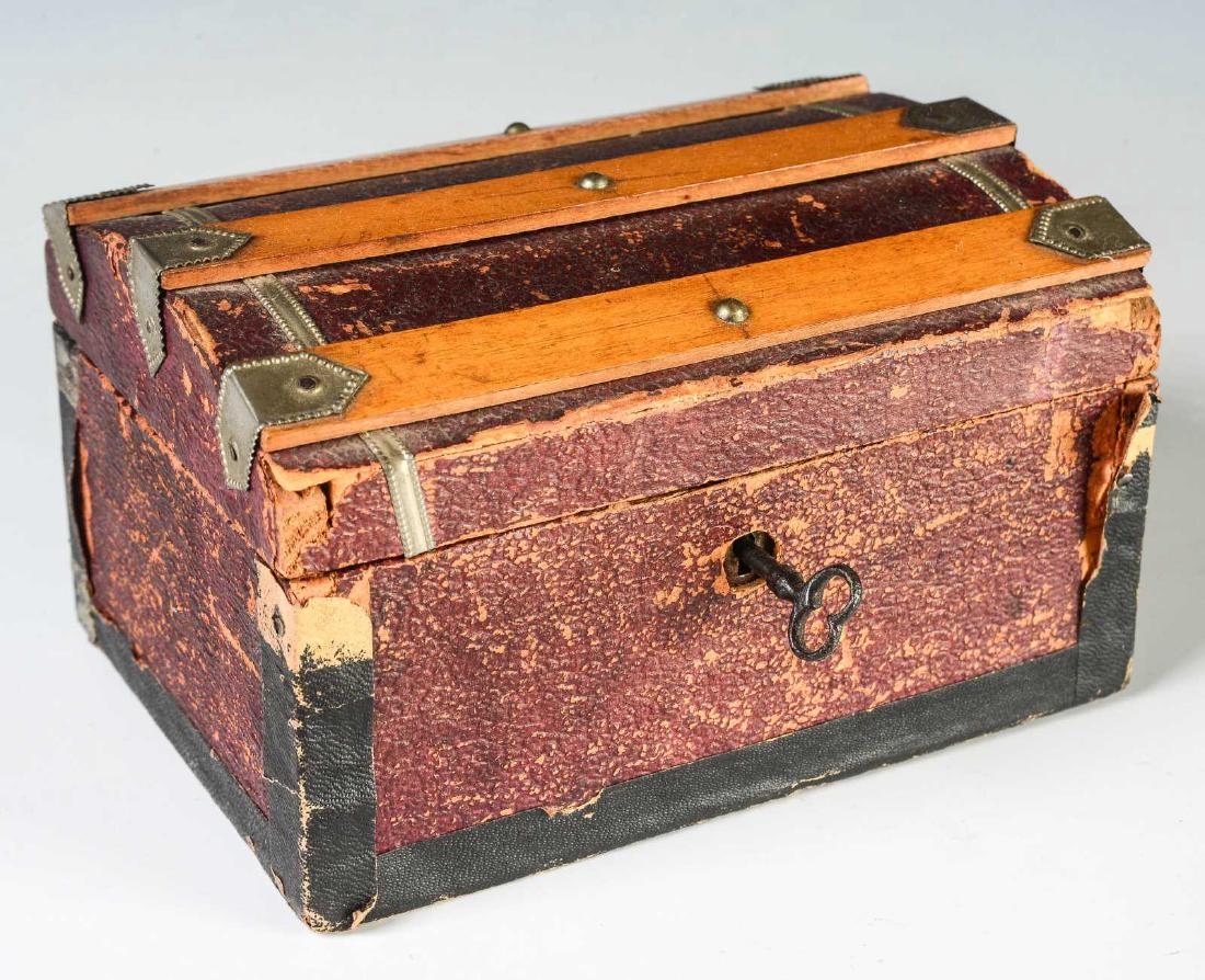 A 19TH CENTURY DOLL SIZE VICTORIAN TRAVEL TRUNK (1 of 9)