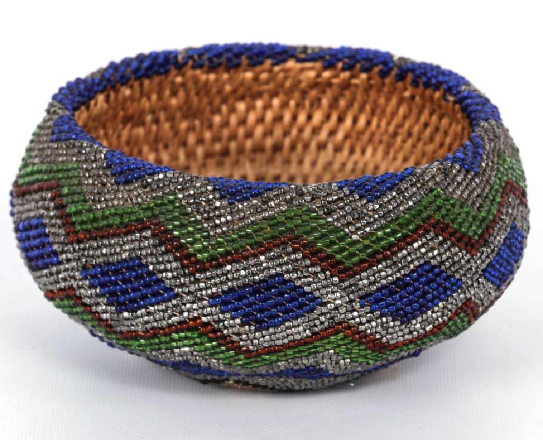 A CIRCA 1900 PAIUTE BEADED BASKET (1 of 7)