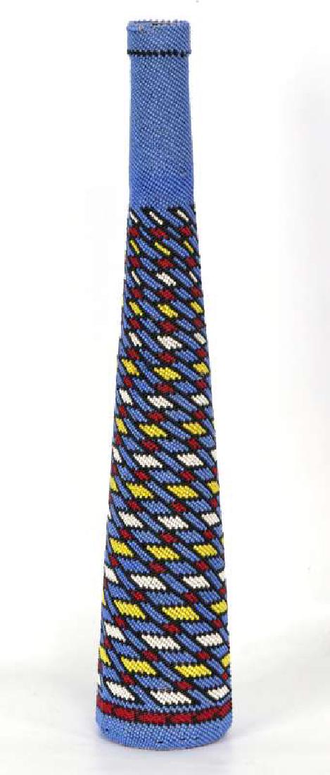 A MID TO LATE 20TH CENTURY PAIUTE BEADED BOTTLE (1 of 9)