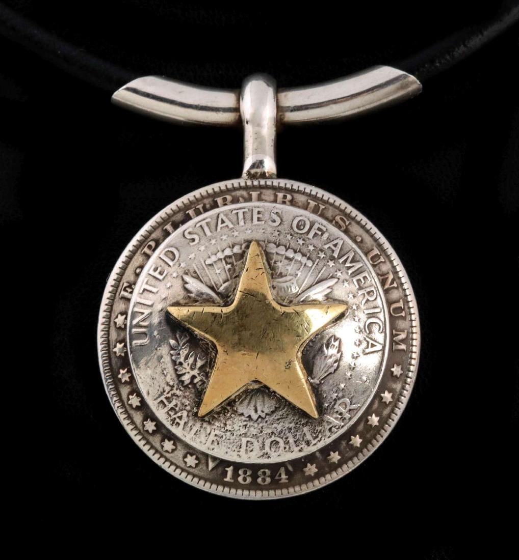 AN ARNOLD GOLDSTEIN DOMED SILVER DOLLAR PENDANT (1 of 10)