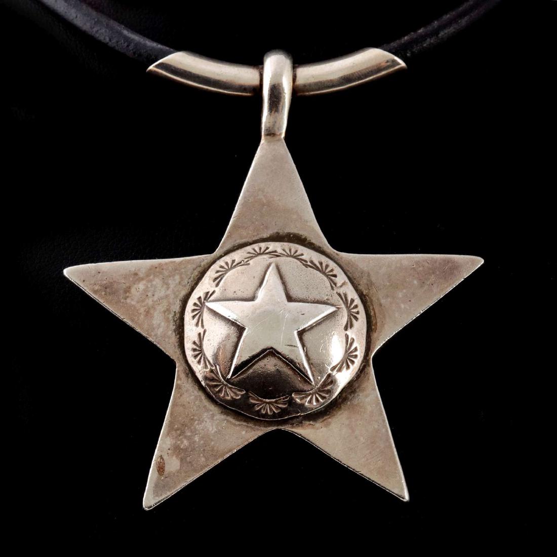 AN ARNOLD GOLDSTEIN STERLING STAR PENDANT (1 of 9)
