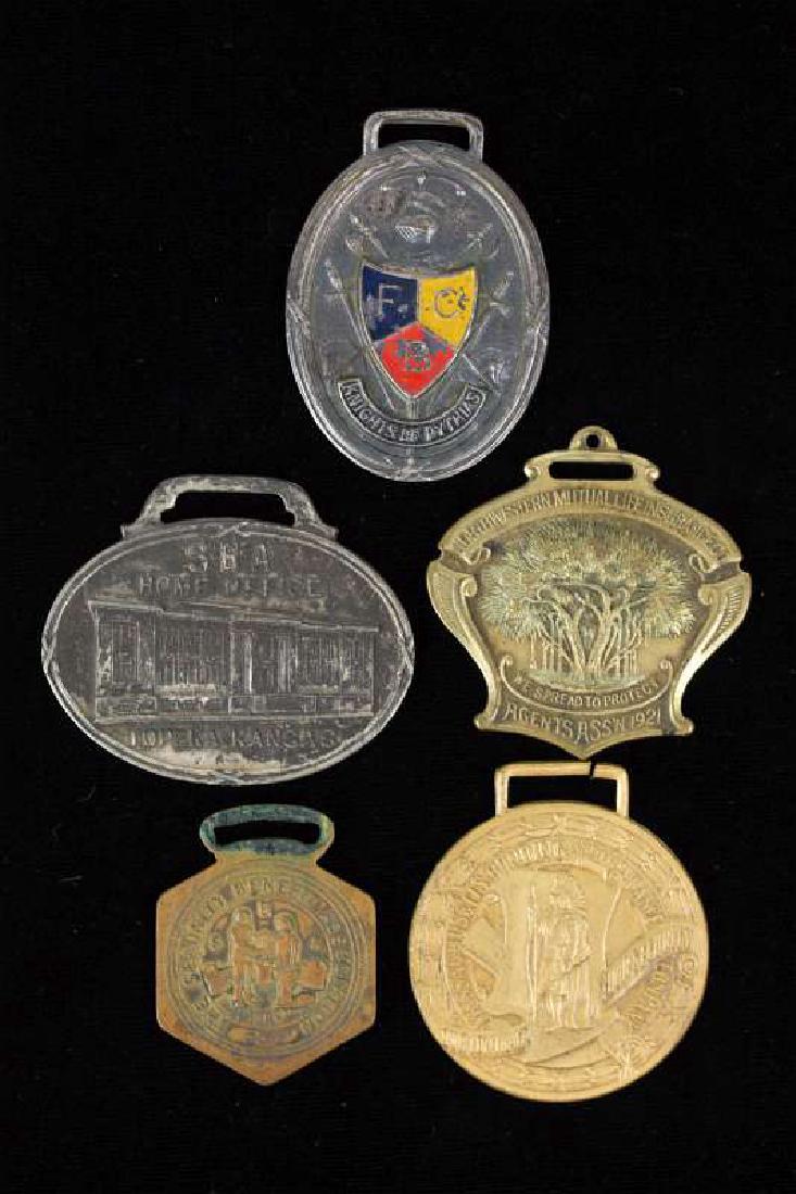 FIVE INSURANCE AND BONDING CO. ADVERTISING FOBS: Includes The Supreme Lodge Knights of Pythias Insurance Department.SBA Home Office, Topeka, Kansas.Northwestern Mutual Insurance Co. Agents Ass'n 1921.Enameled The Security Benefit Association.Massach