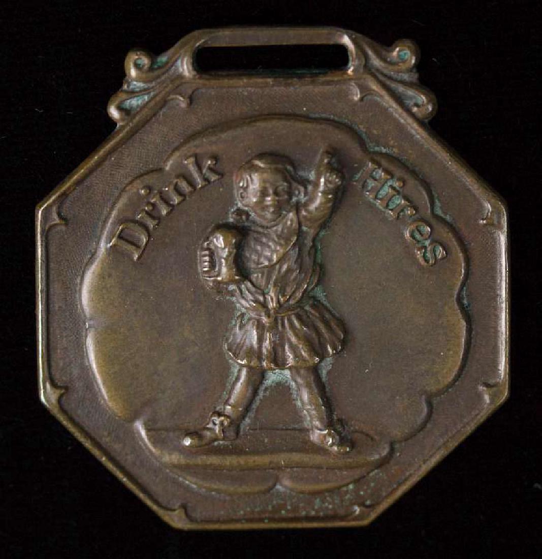 DRINK HIRES ROOT BEER ADVERTISING FOB: Die struck uniface metal fob with 'Drink Hires' boy, uniface. Measures 1.75 inches x 1.5 inches. We happily provide seamless in-house packing and shipping services on nearly everything we sell.