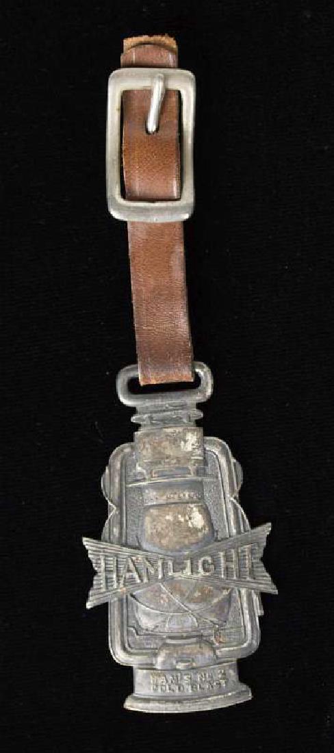 HAMLIGHT CT HAM'S NO. 2 COLD BLAST LANTERN FOB: Die struck double-sided fob, obverse reads 'HAMLIGHT, Ham's No. 2 Cold Blast,' reverse reads 'The original and only perfect cold blast lantern, all others are IMITATIONS, C.T. Ham Mfg. Co., Rochester,