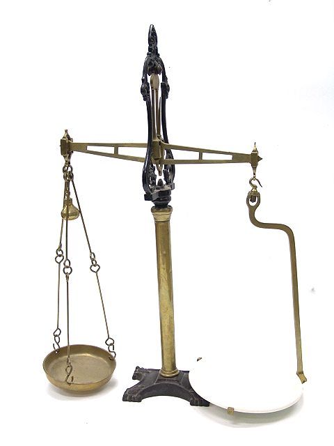 SET OF OLD BRASS BEAM BALANCE SCALES: Nice older set measuring 27 inches high. Good condition.