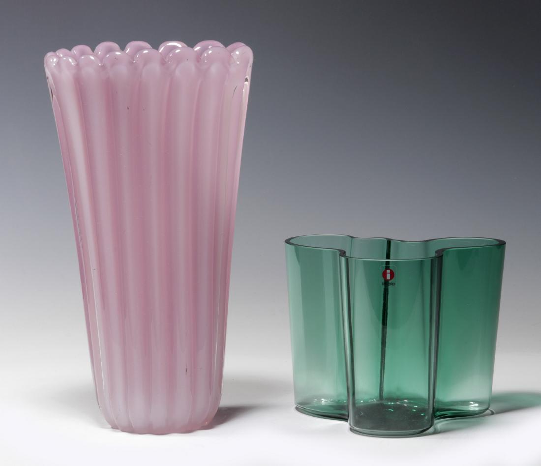 ALVAR AALTO AND OTHER MURANO GLASS: Alvar Aalto (1898-1976) green glass vase, etched signature under the base, marked with a sticker on the side. Pink glass vase attributed Seguso. Measure 4.75 x 6 inches and 10.25 x 5.5 x 3.75 inches. 