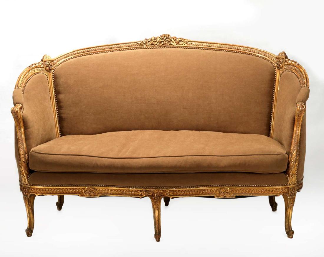 A CIRCA 1900 LOUIS XVI CARVED AND GILDED SOFA (1 of 9)