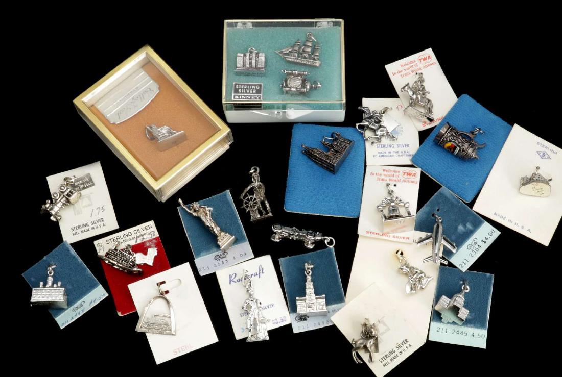 A LARGE LOT OF VINTAGE STERLING SILVER CHARMS (1 of 6)