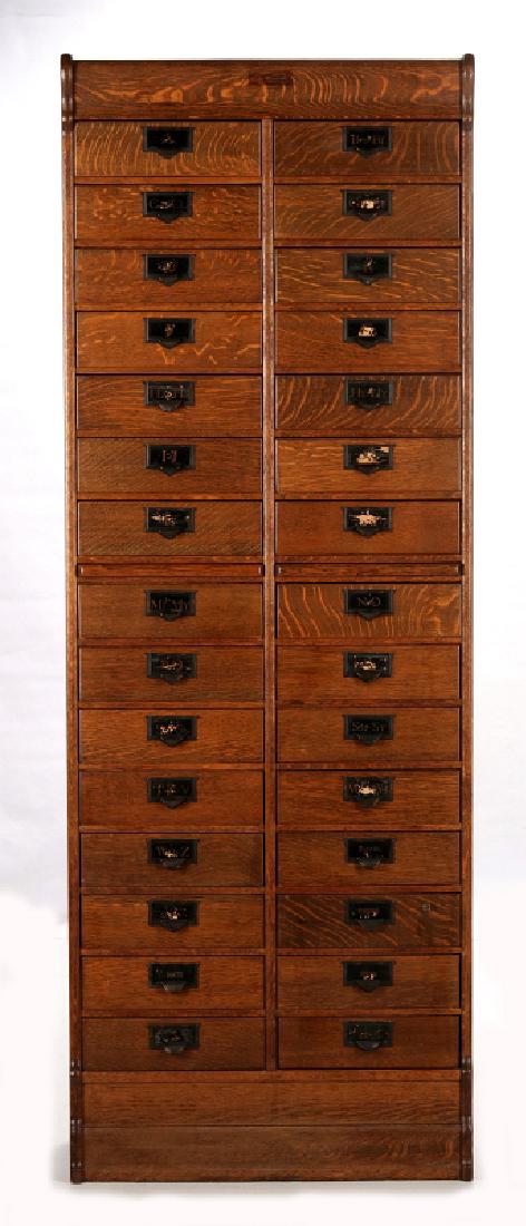A GLOBE WERNICKE OAK THIRTY DRAWER FILE CABINET (1 of 8)