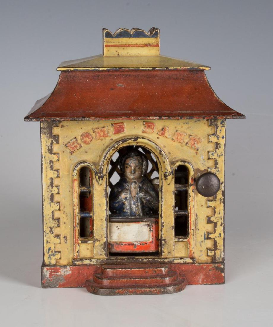 HOME BANK CAST IRON MECHANICAL BANK W/ CASHIER (1 of 7)
