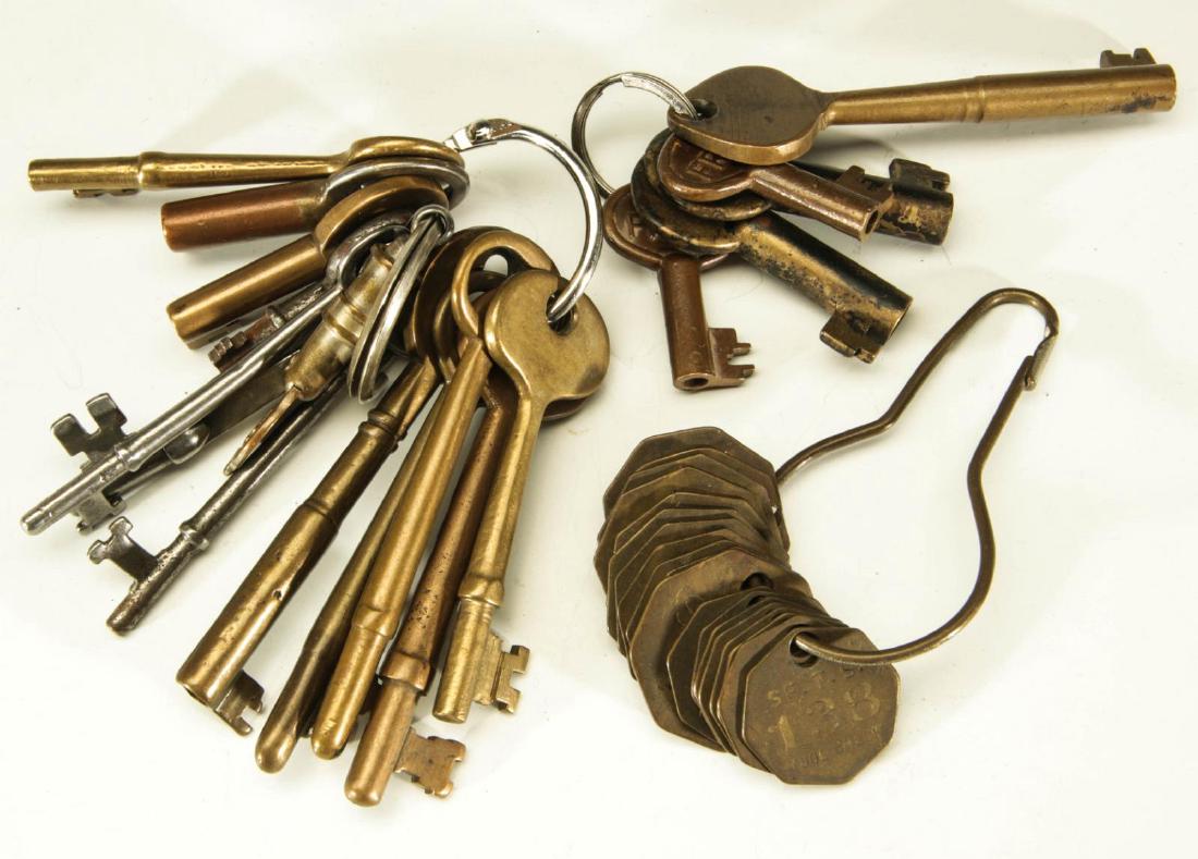 A COLLECTION OF RAILROAD KEYS AND ATSF TOOL CHECKS (1 of 7)