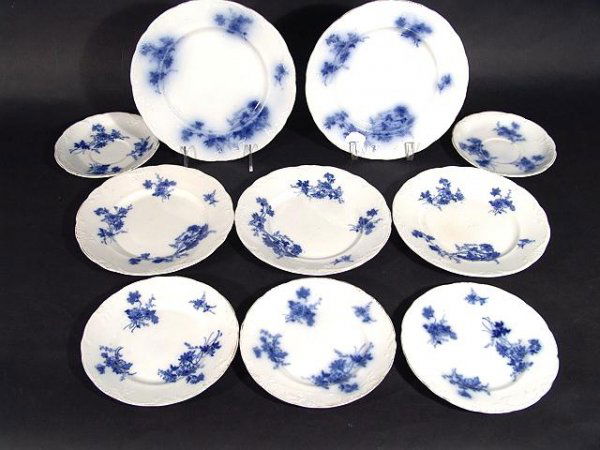 10 PIECES MEAKIN FLOW BLUE - CLIFTON PATTERN: Includes: Two 9" plates,one is in good shape the other has a back rim chip, Three 8" plates, one has a 4" long crack, the other two have tiny back rim chips,Three 7" plates, all have chips to back rim