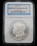 A 1880 S MORGAN SILVER DOLLAR GRADED