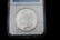 A 1880 S MORGAN SILVER DOLLAR GRADED - 2