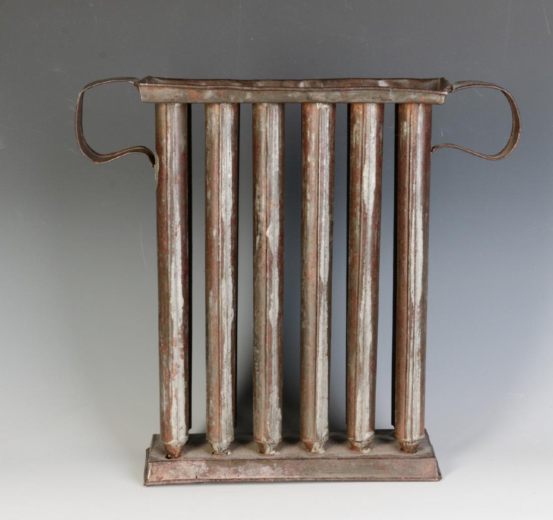 A 19TH CENTURY TIN CANDLE MOLD WITH TWELVE TUBES (1 of 8)