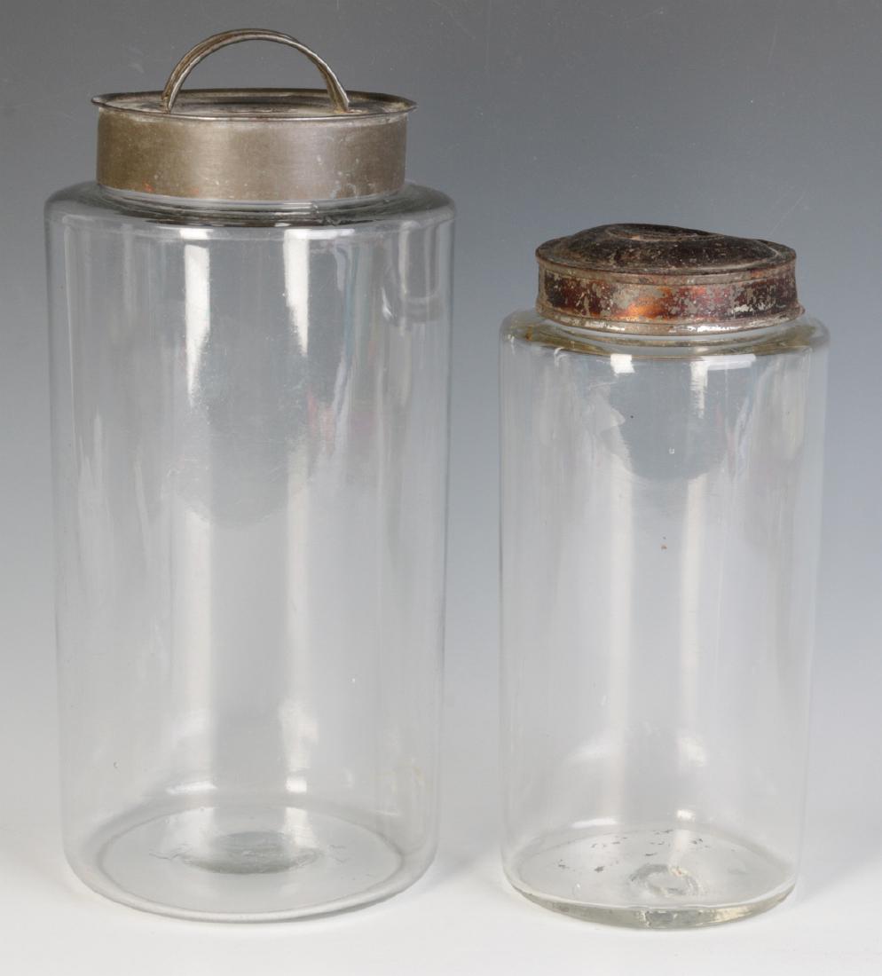 TWO EARLY BLOWN GLASS STORAGE JARS (1 of 7)