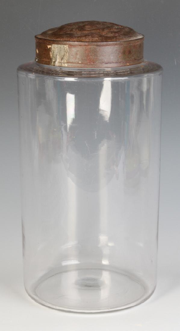 A TALL EARLY BLOWN GLASS STORAGE JAR WITH TOLE LID (1 of 5)