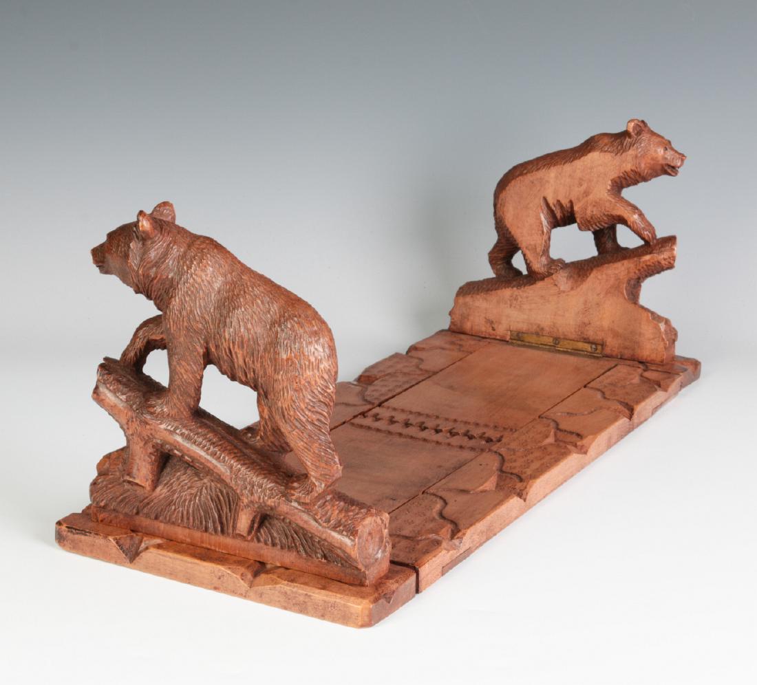 AN EARLY 20TH C BLACK FOREST BOOK STAND WITH BEARS (1 of 9)