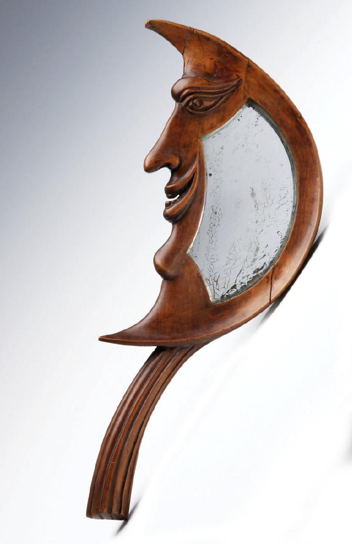 AN EARLY 20TH C. CARVED CRESCENT MOON HAND MIRROR (1 of 5)